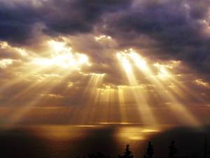 sun rays through the clouds image
