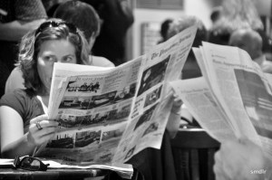 lady with newspaper image